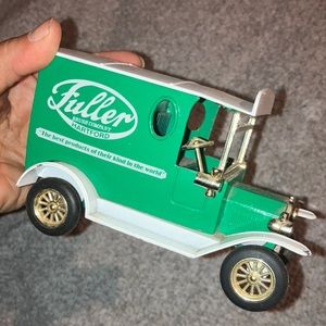 Fuller brush company, diecast metal bank